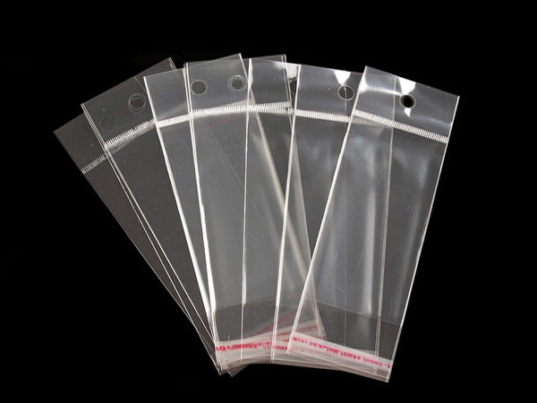 Pungi transparente din plastic, autoadezive, cu orificiu de agățare (5 x 9 cm)